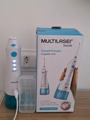 Irrigador oral portátil