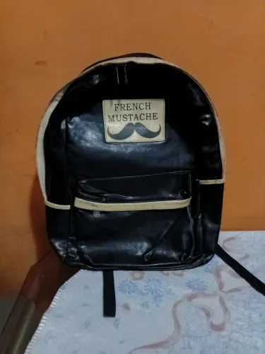 Mochila couro.