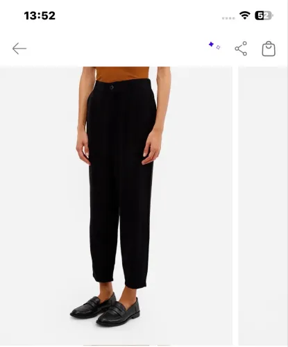 Calça alfaiataria com pregas preta