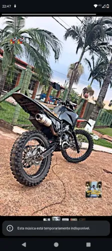 Moto em perfeita situação,moto muito boa pra trilha ,vai com pneu traseiro novo!!!!!