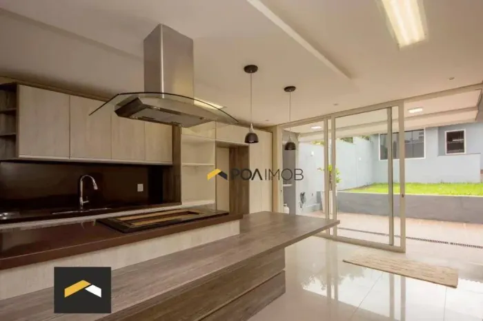 Casa com 3 dormitórios para alugar, 190 m² por R$ 6.500,00/mês - Vila Ipiranga - Porto Ale