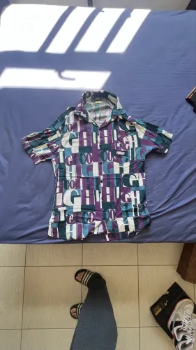 Camisa de botão HIGH