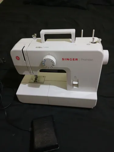 Máquina de costura singer