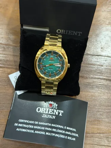 Relógio automático 3 estrelas Orient dourado fundo verde novo e original! 