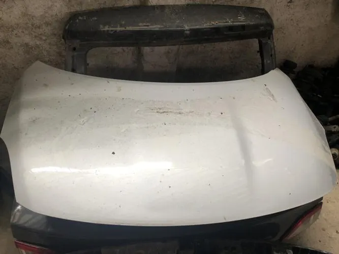 Capô Nissan versa (extra)