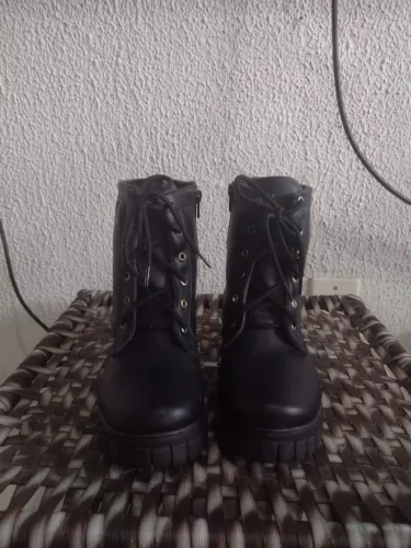 Coturno/bota tratorada