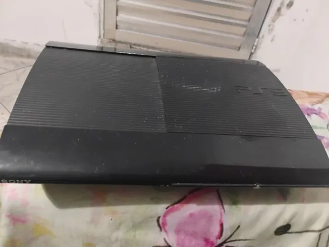 PS3 Slim original 500GB (apenas console) + 38 jogos originais.