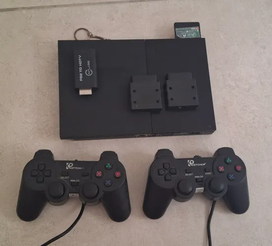 Ps2 slim + 2 controles + 1 memory card e diversos jogos