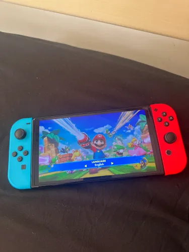 Nintendo Switch OLED 64GB + MicroSD 128GB + Joy-Con + Dock