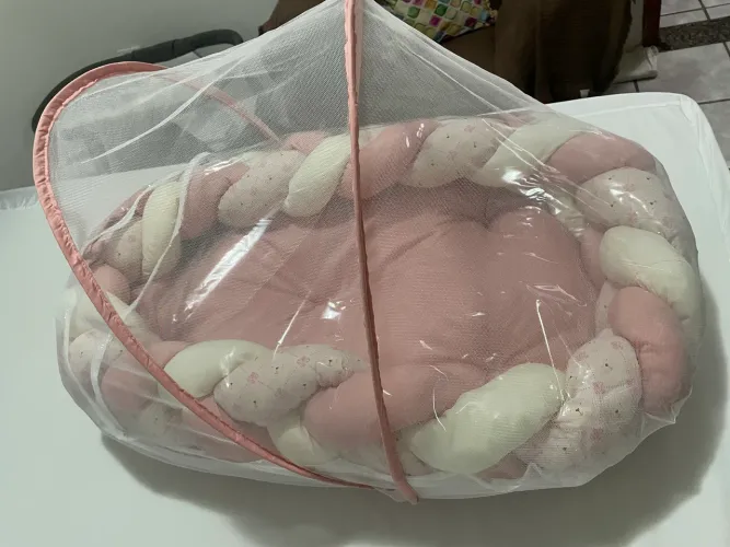 Ninho para bebê com mosquiteiro