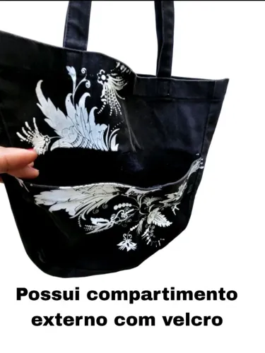 bolsa rosa chá confeccionada em tecido , cor preta com trama acinzentada