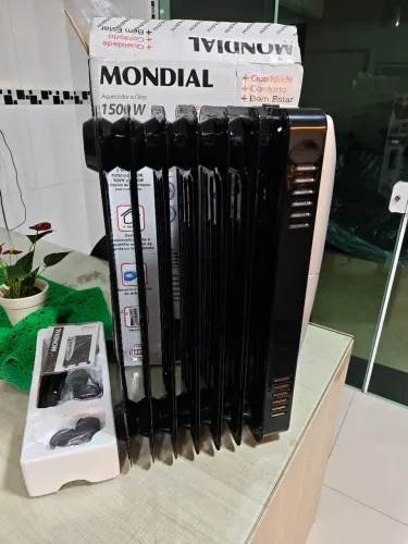 Aquecedor a óleo mondial 1500w 220v novo sem uso 
