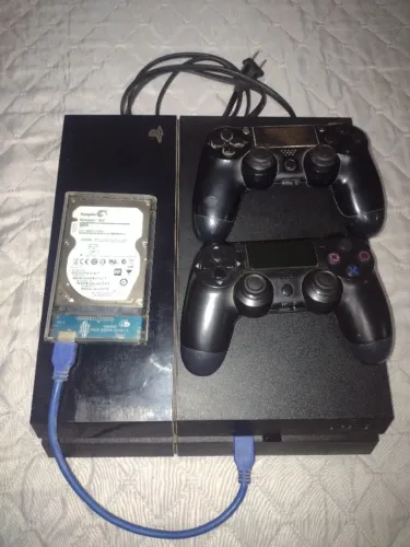 Ps4 em ótimo estado 500 de memória interna mais hd de 500 gigas