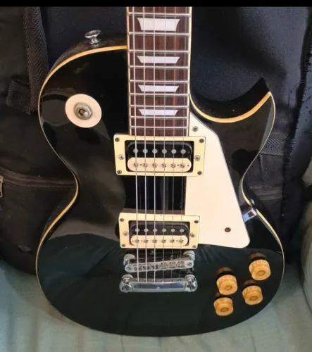 Guitarra Les Paul Hurricane Preta Seg 277 Bk + Bag + Jogo de Cordas