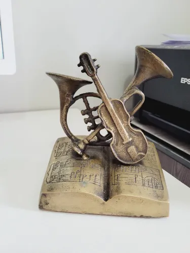 Escultura musical antiga em Bronze