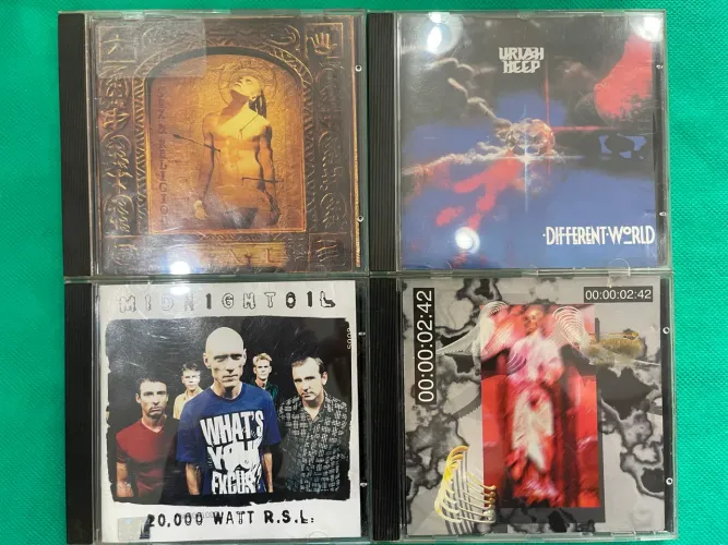 Lote 4 CDs Rock, Metal e Alternativo - Steve Vai, Uriah Heep, Midnight Oil, Front 242