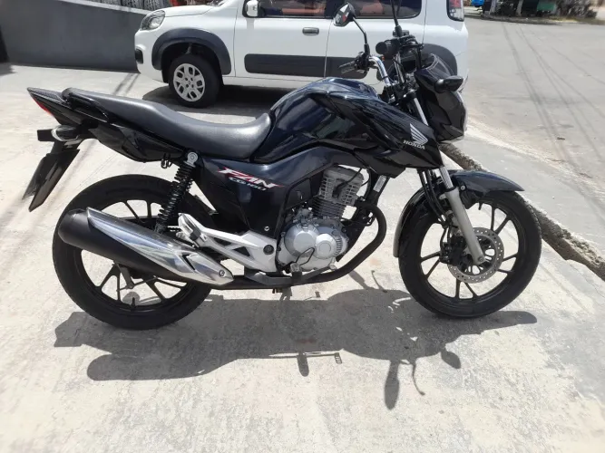 Moto em estado de nova e único dono