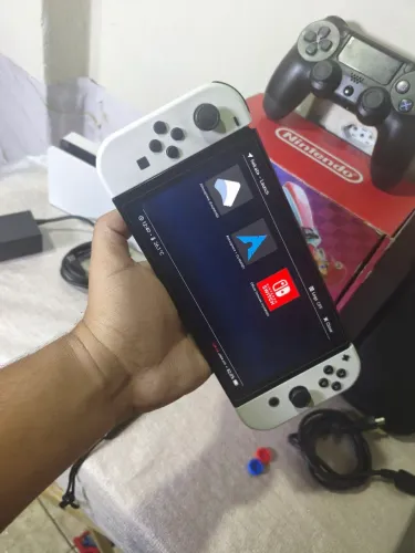 Switch OLED desbloqueado com jogos/aceito cartão ate 18x
