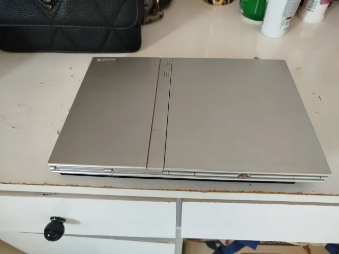 Playstation 2 ( com defeito). Não funciona!