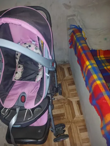 Carrinho de bebê com caderinha