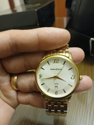 Relogio dourado em ótimo estado 13 anos de uso