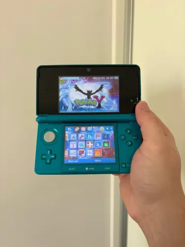 Nintendo 3ds com muitos jogos como Pokémon Zelda e Mario + carregador e caneta