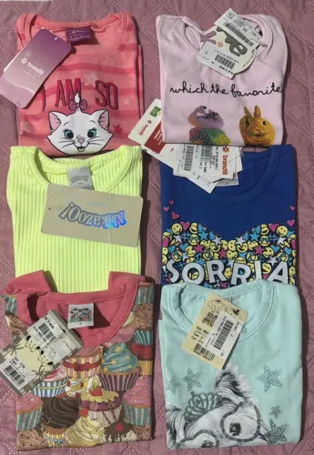 Vendo esse lote de blusinhas 2 anos diversas marcas novas 75,00