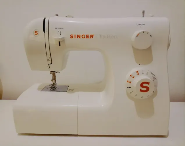 Máquina de costura singer