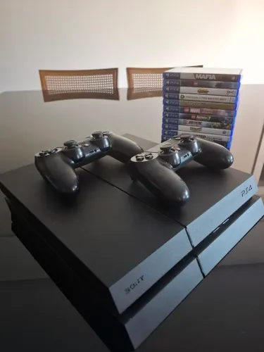 Ps4 com 2 controles originais + 11 jogos