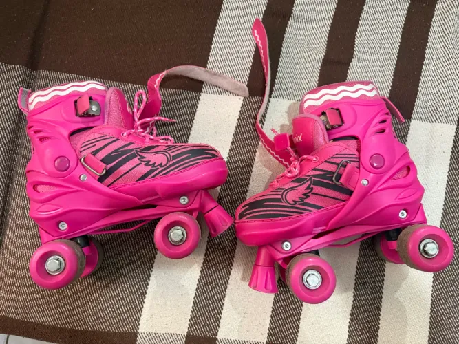 Patins infantil rosa com acessórios