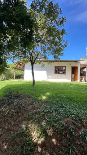 Chácara escriturada com 2.500 m², pomar e casa aconchegante no Retiro do Congo em Vila Vel