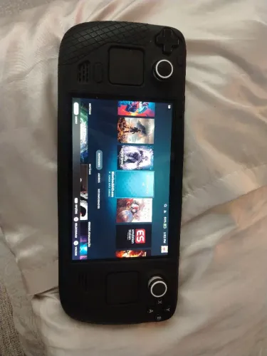 Vendo steam deck muito conservado com a bag e capa  + carregador 2.850