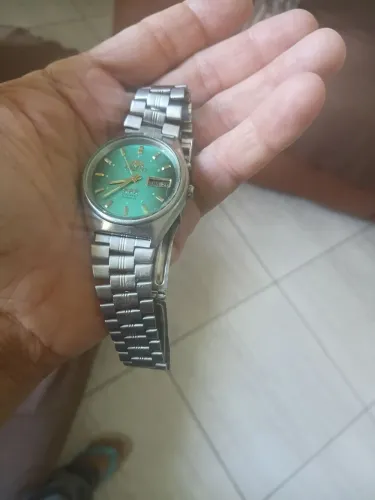 Relógio oriente original com duas chaves antigo funcionando perfeitamente 