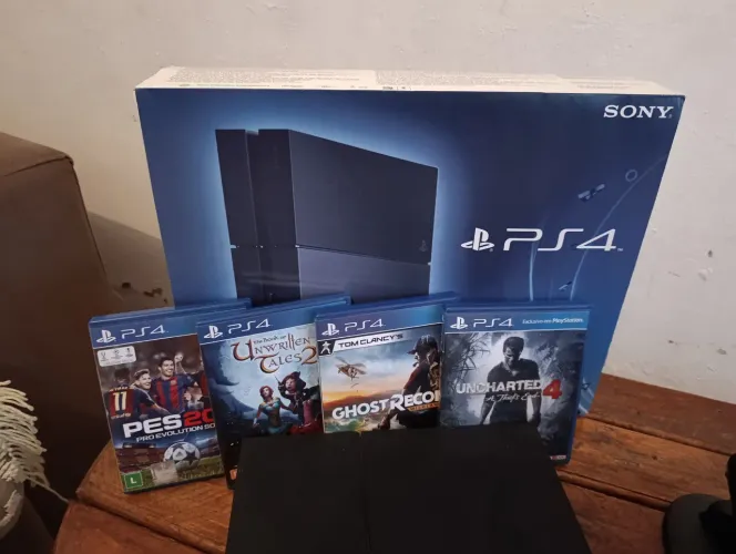 PS4 NA CAIXA+ BASE DE CARREGAMENTO E 4 JOGOS A SUA ESCOLHA!