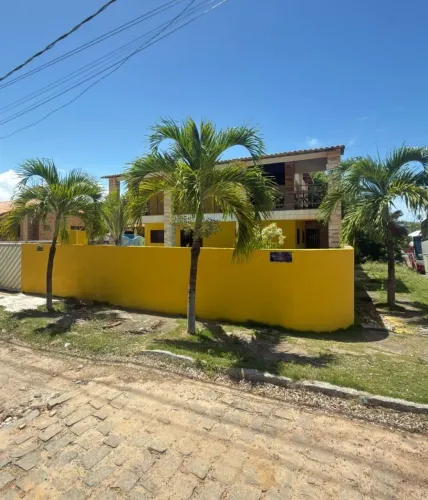 Casa com 4 dormitórios à venda, 235 m² por R$ 750.000,00 - Carapibus - Conde/PB