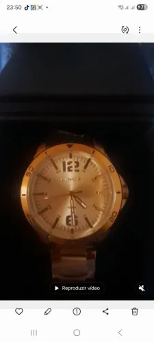 Vendo relógio dourado 