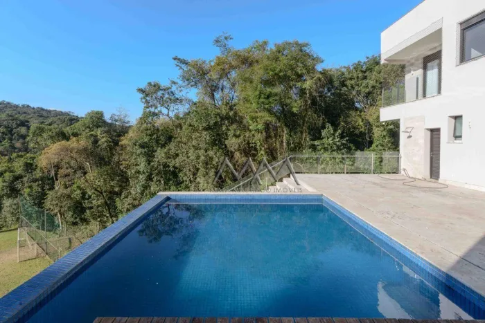 Casa à Venda ou Locação no Condomínio Pasárgada | 1.100 m² - 6 Suítes