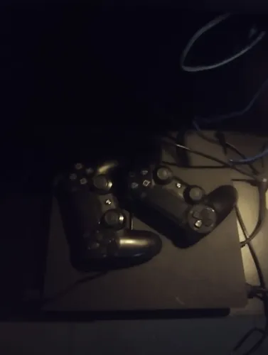 Vai com caixa, 2 DUALSHOCKS(com defeito) cabo HDMI, cabo fonte