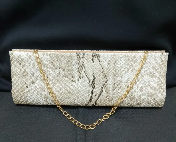 Bolsa de mão feminina em couro de cobra