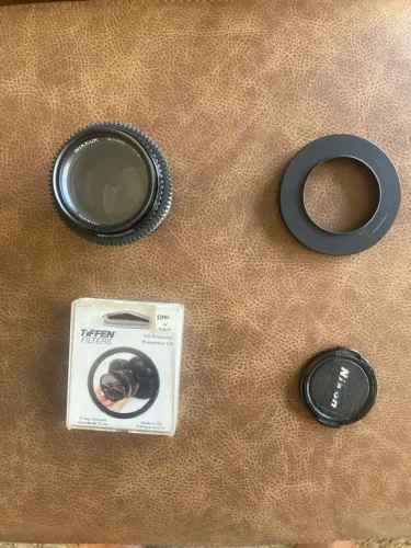 Lente Nikon AIS AI 85mm f2 + Filtro UV Tiffen + focus gear Tilta + step up Ring 77mm