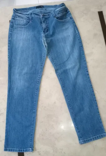 Calça EXSS usada tamanho 46 com desgaste de uso