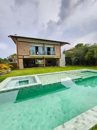 Casa a venda em praia do forte com 6 suites mobiliada piscina áre gourmet no praia bella