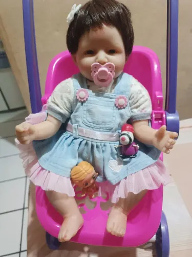 Bb reborn aproximadamente 45 cm mais carrinho de bb 