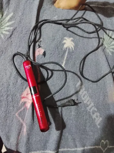 Prancha gama ótima perfeito estado pouco tempo de uso , mot da venda uso cabelo molhado