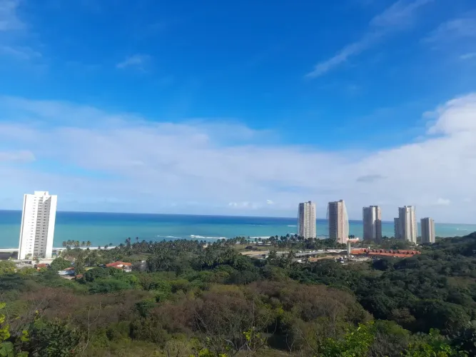 Condomínio Tramonto completo área de lazer e vista mar - lote 590m² - Repasse + parcelas