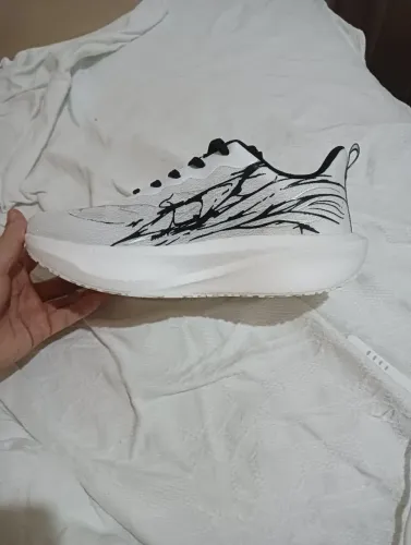 Tênis de corrida com placa de carbono 