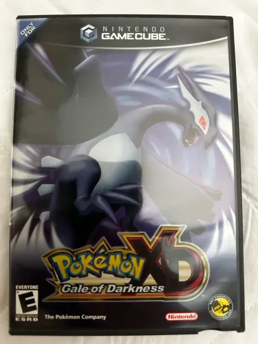 Jogo Pokémon XB Gale of Darkness para game cube com capa, encarte e manual