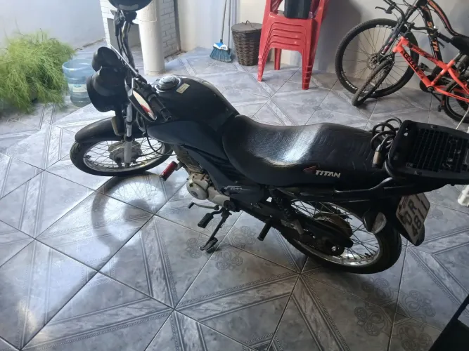 Vendo essa moto fan 125 2013 a pedal no ponto de transferir 