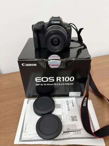 Canon R100 com lente do kit, caixa, manuais