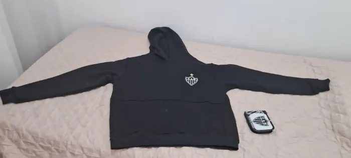 Vendo jaqueta de frio do galo por 150,00 com uma carteira de brind
